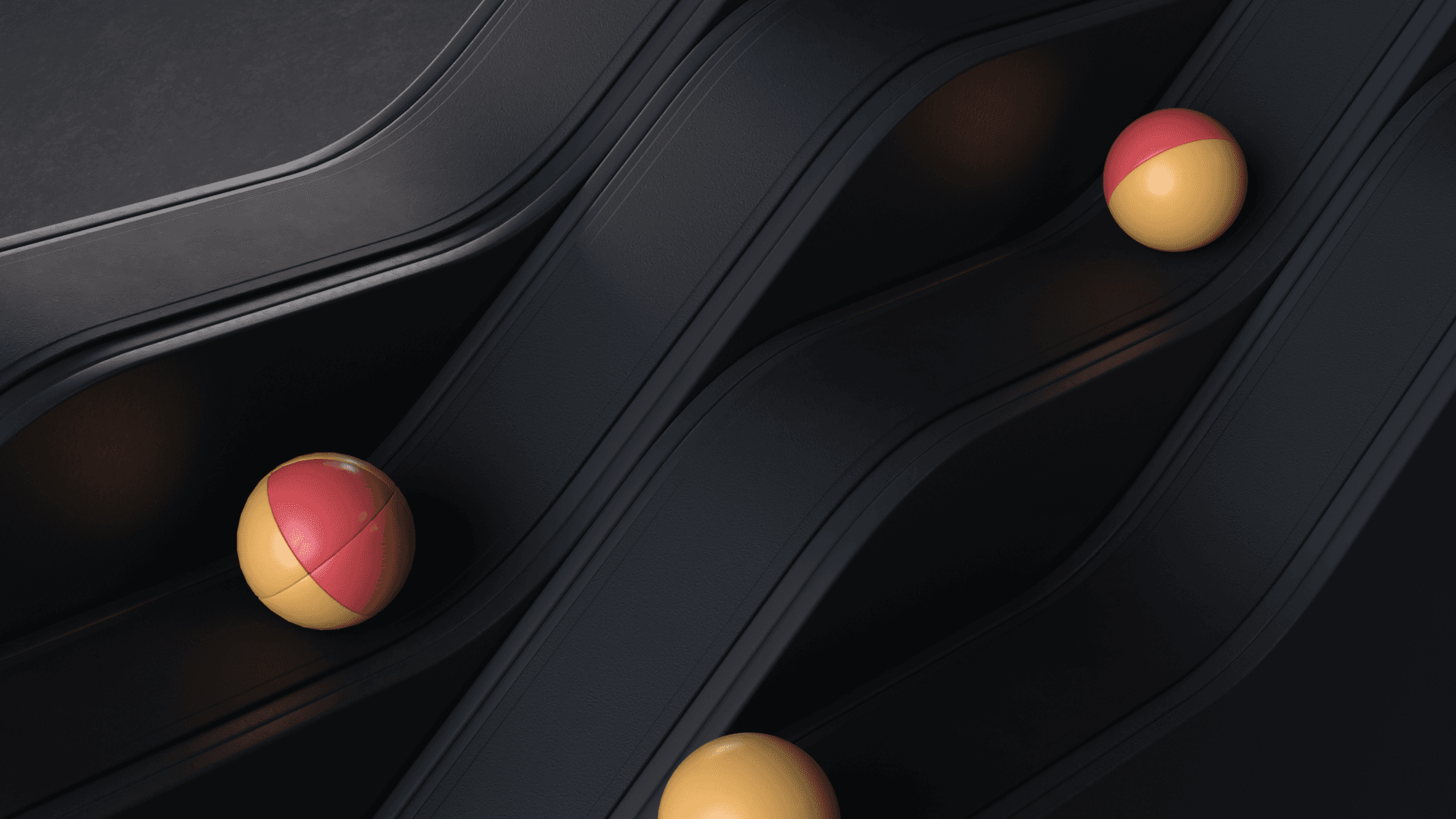 Imagem de esferas vermelhas e amarelas rolando para baixo